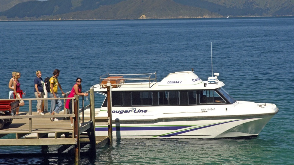 Travellers get ready to board a Cougar Line vessel in the Marlborough Sounds